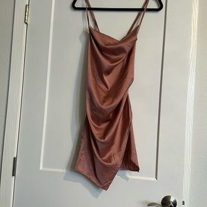 Blush colored women’s slit mini dress cross back size M